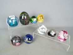Paperweights - five glass dome Caithness paperweights,