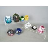 Paperweights - five glass dome Caithness paperweights,