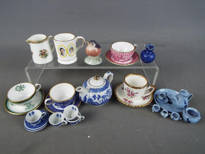 A collection of miniature ceramics to include Spode cups and saucers, Chelson China,