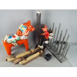 A large wooden painted Dala / Dalecarlian horse, approximately 37 cm (h), electric candle lights,