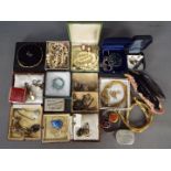 A good lot of costume jewellery with some 925 silver to include enamelled pendant on chain,