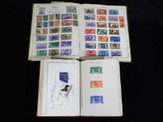 Philately - two stamp albums containing UK and worldwide postage stamps (2)