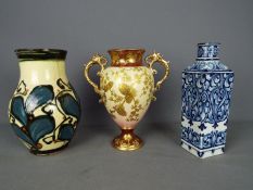 An early 20th century, square section, Villeroy & Boch Delft vase,