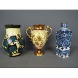 An early 20th century, square section, Villeroy & Boch Delft vase,