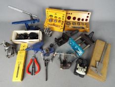 A collection of watchmakers / repairers tools and similar.