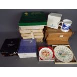 A quantity of various collector plates, boxed.