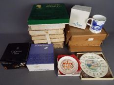 A quantity of various collector plates, boxed.