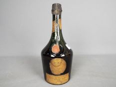A vintage bottle of Benedictine DOM Liqueur.