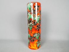 An Anita Harris vase decorated with blackberries,