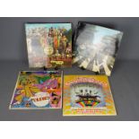The Beatles - Four 12" Beatles vinyl records comprising Abbey Road PCS7088 (French issue),
