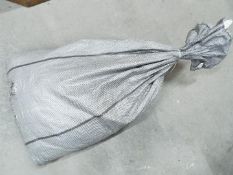 Costume Jewellery - A sealed sack containing approximately 26 Kg of unsorted costume jewellery.