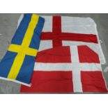 Three flags comprising Denmark, England and Sweden.