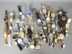 A large quantity of wristwatches / wristwatch parts.