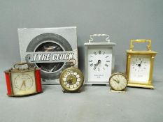 A collection of clocks to include carriage clocks, alarm clocks and similar.