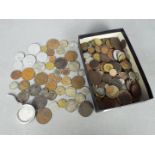 A quantity of predominantly foreign coins including U.