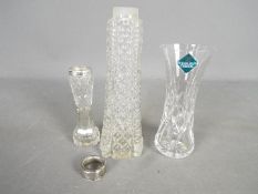 An Edinburgh Crystal glass vase and two other having hallmarked silver collars.