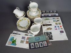 A mixed lot to include ceramics, mint stamps and first day covers.