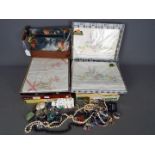 Six boxed sets of vintage Irish linen, all appear unused, and a small quantity of costume jewellery.