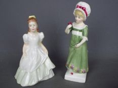 Two Royal Doulton figurines entitled Kerry approx height 15.5 cm and Ruth approx height 13.