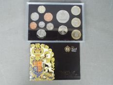 A 2009 UK Proof Coin Set (Kew Gardens 50p), with certificate of authenticity.