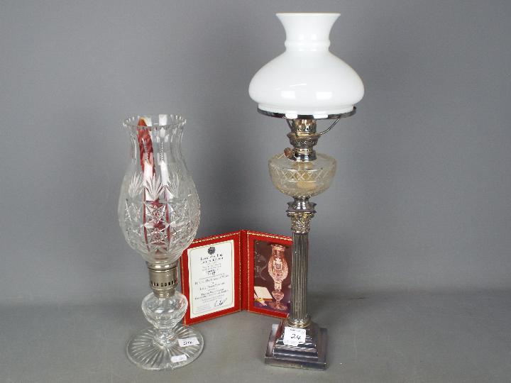 An Elkington Plate oil lamp with glass diffuser,