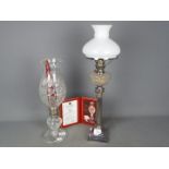 An Elkington Plate oil lamp with glass diffuser,