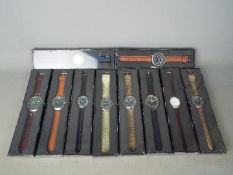 Ten gentleman's wristwatches, factory sealed in original packaging.