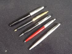 Pens - A collection of writing instruments to include a Papermate ball point,