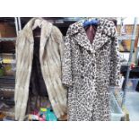 Fashion - a light brown fur three quarter length coat, approx 95 cm length, a dark brown fur coat,