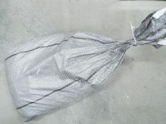 Costume Jewellery - A sealed sack containing approximately 28 Kg of unsorted costume jewellery.