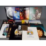 Queen - A collection of 12" vinyl records and two CD's by Queen.