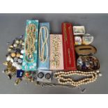 Costume Jewellery - a quantity of costume jewellery to include paired earrings,