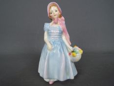 A Royal Doulton figurine entitled Wendy,