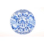 Chinese blue and white plate decorated with vases and scenes, four character marks to base.