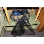 Assorted fishing equipment including rod and rod stands, reels, keep net, bag and accessories.