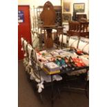 Rectangular glass topped and metal dining table and eight chairs including pair carvers.