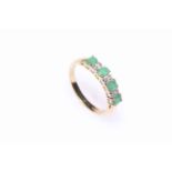 9 carat gold, emerald and diamond ring.