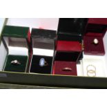 Collection of seven 9 carat gold rings.