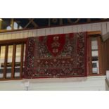 Persian design prayer rug with a red ground, 1.80 by 1.20.