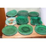 Collection of Majolica including fruit bowl, two handled dish, plates.
