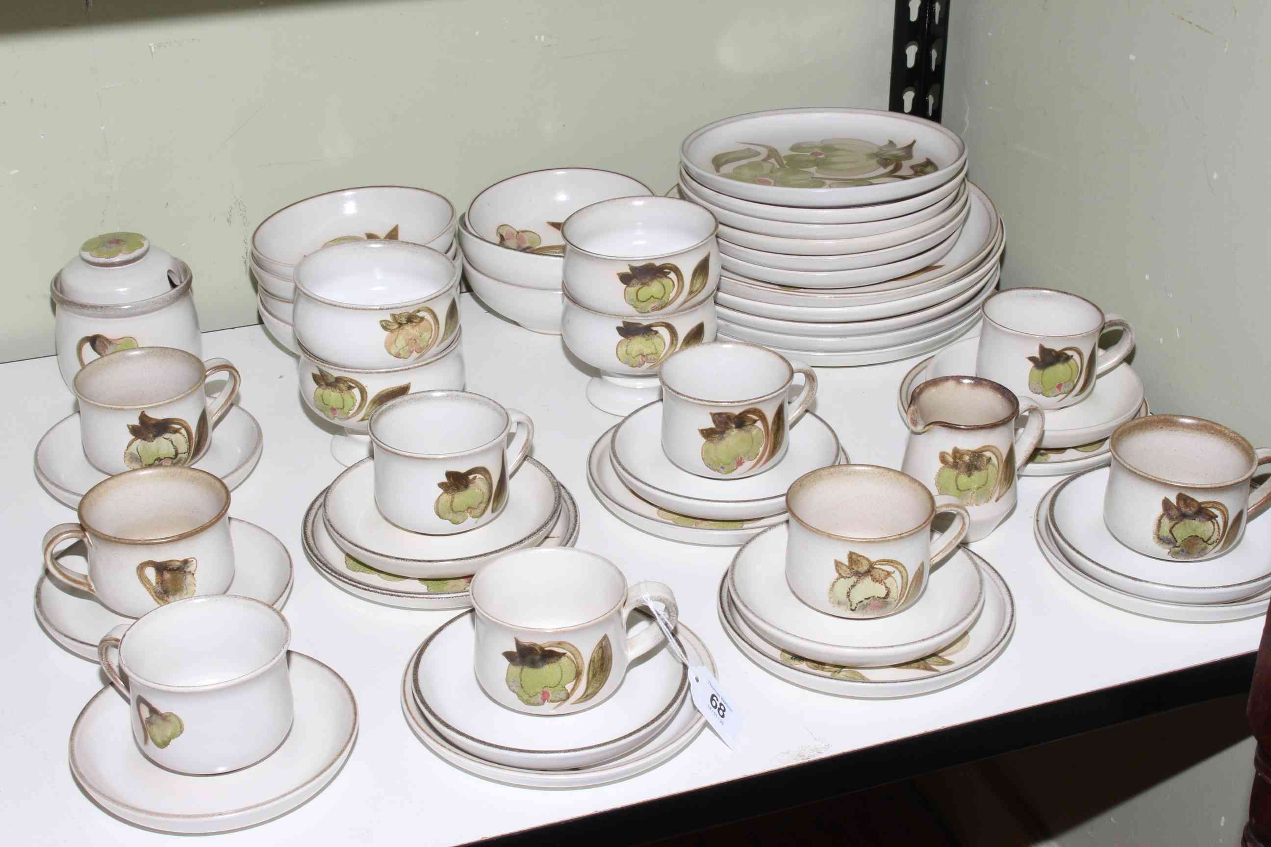 Forty eight pieces of Denby Troubadour tableware.