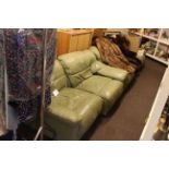 Sage green leather four piece lounge suite comprising three seater and two seater settees,
