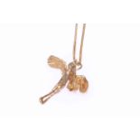 9 carat gold stork pendant.