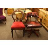 Ox blood leather swivel office open armchair and Victorian mahogany balloon back chair (2).