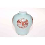 Chinese baluster vase decorated with four iron red phoenix motifs on pale blue ground,