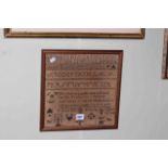 19th Century alphabet and religious text sampler in glazed frame, 28cm by 28cm.