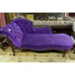 Victorian walnut framed chaise longue with serpentine form seat.