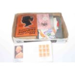 Box of loose stamps, Stanley Gibbons catalogue, schoolboy stamp book and two Roman coins,