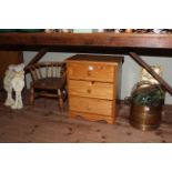Pedestal chest, child's chair, stationery cabinet, horse brasses, dolls.