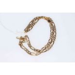 9 carat gold chain link necklace with silver decoration.